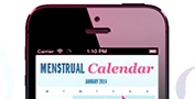 Slika mobitela koji prikazuje menstrualni kalendar. Slika ilustrira kako izgleda aplikacija o.b.® Menstrualni kalendar.